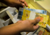 Caixa começa a pagar parcela de outubro do Auxílio Brasil